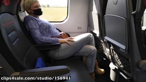Crossed legs orgasm on a train